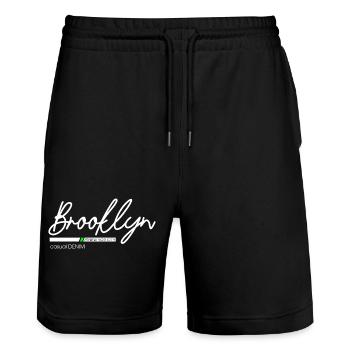 Stadtbild mit Neonlichtern und Bergblick - Stanley/Stella Unisex Bio Joggingshorts Trainer  - Schwarz - Vorne - Nik (191cm) & Marisol (170cm)
