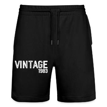 Vintage 1983 - Stanley/Stella Trainer Unisex Organic Jogging Shorts - black - Front - Nik (191cm) & Marisol (170cm)