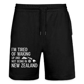 Tired Waking Up And Not Being In New Zealand - Stanley/Stella Trainer Unisex Organic Jogging Shorts - black - Front - Nik (191cm) & Marisol (170cm)