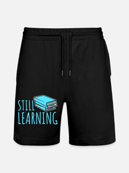 Still Learning Growth Student Motivation Saying - Stanley/Stella Trainer Unisex Organic Jogging Shorts - black
