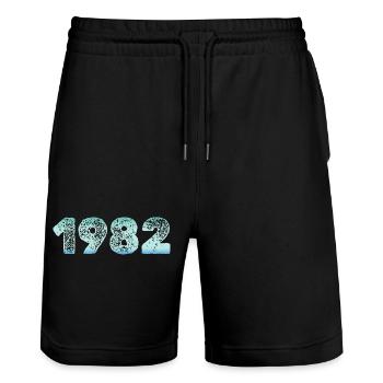 Grunge Naissance 1982 - Short de jogging bio TRAINER Stanley/Stella unisexe - noir - Devant - Nik (191cm) & Marisol (170cm)