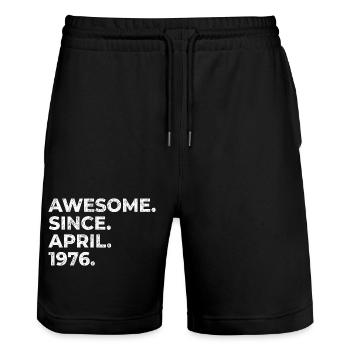 Awesome since April 1976 | Geburtstag | Geschenk - Stanley/Stella Unisex Bio Joggingshorts Trainer  - Schwarz - Vorne - Nik (191cm) & Marisol (170cm)