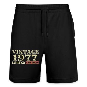 1977 Vintage :47e Anniversaire Cadeau Rétro Unique - Short de jogging bio TRAINER Stanley/Stella unisexe - noir - Devant - Nik (191cm) & Marisol (170cm)
