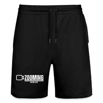 ZOOMING IN ON LIFE - Stanley/Stella Trainer Unisex Organic Jogging Shorts - black - Front - Nik (191cm) & Marisol (170cm)