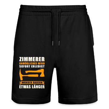 Zimmerer Zimmermann | Zimmermeister Geschenk - Stanley/Stella Unisex Bio Joggingshorts Trainer  - Schwarz - Vorne - Nik (191cm) & Marisol (170cm)