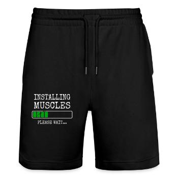 L’installation des muscles muscles installe l’entraînement au gymnase - Short de jogging bio TRAINER Stanley/Stella unisexe - noir - Devant - Nik (191cm) & Marisol (170cm)