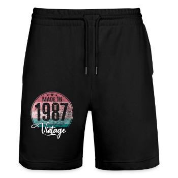 Millésime Fabriqué en 1987 Année de naissance 1987 Anniversaire - Short de jogging bio TRAINER Stanley/Stella unisexe - noir - Devant - Nik (191cm) & Marisol (170cm)