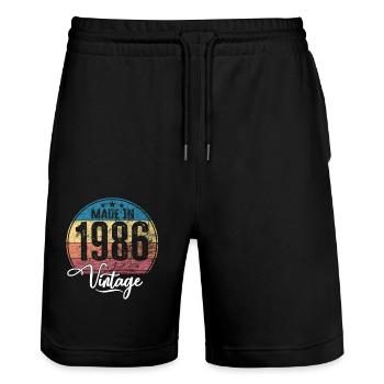 Millésime Fabriqué en 1986 Année de naissance 1986 Anniversaire - Short de jogging bio TRAINER Stanley/Stella unisexe - noir - Devant - Nik (191cm) & Marisol (170cm)