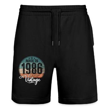 Millésime Fabriqué en 1986 Année de naissance 1986 Anniversaire - Short de jogging bio TRAINER Stanley/Stella unisexe - noir - Devant - Nik (191cm) & Marisol (170cm)
