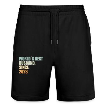 bester Ehemann seit 2023 1.Hochzeitstag - Stanley/Stella Unisex Bio Joggingshorts Trainer  - Schwarz - Vorne - Nik (191cm) & Marisol (170cm)
