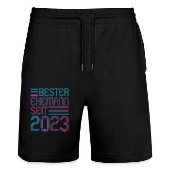 bester Ehemann seit 2023 1.Hochzeitstag - Stanley/Stella Unisex Bio Joggingshorts Trainer  - Schwarz - Vorne - Nik (191cm) & Marisol (170cm)