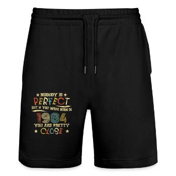 1984 Birthday Vintage Nobody is perfect - Stanley/Stella Trainer Unisex Organic Jogging Shorts - black - Front - Nik (191cm) & Marisol (170cm)