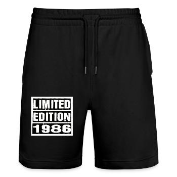 Limited Edition 1986 Geburtstag 1986 Vintage Retro - Stanley/Stella Unisex Bio Joggingshorts Trainer  - Schwarz - Vorne - Nik (191cm) & Marisol (170cm)