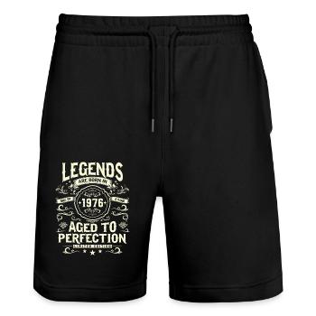 Legendary year of birth '76 - Stanley/Stella Trainer Unisex Organic Jogging Shorts - black - Front - Nik (191cm) & Marisol (170cm)