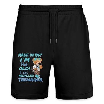 1967 Birthday Teddy funny old teenager - Stanley/Stella Trainer Unisex Organic Jogging Shorts - black - Front - Nik (191cm) & Marisol (170cm)