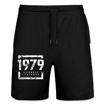 November 1979 Legendär 44 Jahren Mann Frau Geburt - Stanley/Stella Unisex Bio Joggingshorts Trainer  - Schwarz - Vorne - Nik (191cm) & Marisol (170cm)