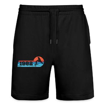 Wingfoil-Surfer Geburtstag Jahrgang 1982 geboren - Stanley/Stella Unisex Bio Joggingshorts Trainer  - Schwarz - Vorne - Nik (191cm) & Marisol (170cm)
