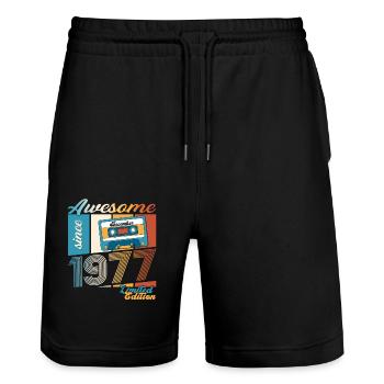 46e anniversaire Cassette décembre Vintage 1977 - Short de jogging bio TRAINER Stanley/Stella unisexe - noir - Devant - Nik (191cm) & Marisol (170cm)