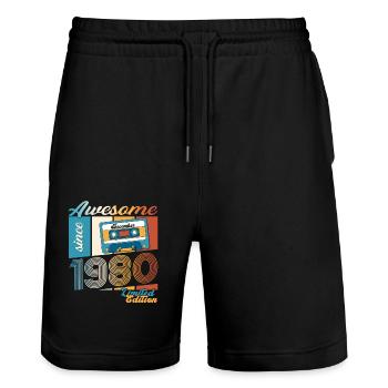 43e anniversaire Cassette décembre Vintage des années 1980 - Short de jogging bio TRAINER Stanley/Stella unisexe - noir - Devant - Nik (191cm) & Marisol (170cm)