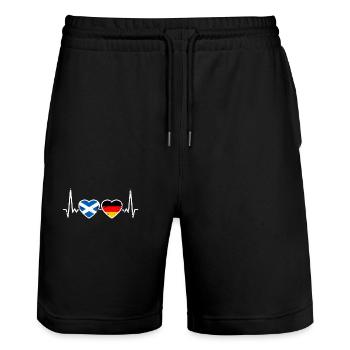 Schottland Deutschland Vintage Herzschlag Flagge - Stanley/Stella Unisex Bio Joggingshorts Trainer  - Schwarz - Vorne - Nik (191cm) & Marisol (170cm)