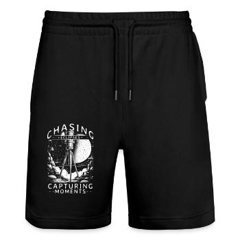 Solar Eclipse Chasing Essential Gear for Chasers - Stanley/Stella Trainer Unisex Organic Jogging Shorts - black - Front - Nik (191cm) & Marisol (170cm)