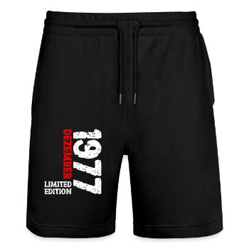 1977 Dezember Limited Edition 46. Geburtstag Deko - Stanley/Stella Unisex Bio Joggingshorts Trainer  - Schwarz - Vorne - Nik (191cm) & Marisol (170cm)