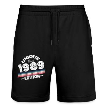 Unique depuis 1989 Edition Anniversaire Millésime 1989 - Short de jogging bio TRAINER Stanley/Stella unisexe - noir - Devant - Nik (191cm) & Marisol (170cm)