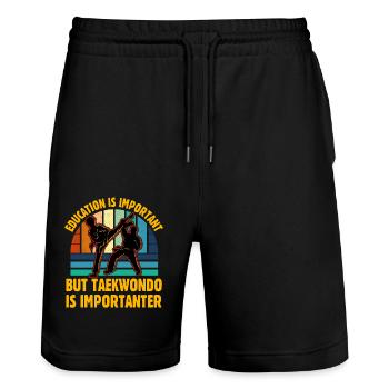 Education is important but Taekwondo is important - Stanley/Stella Trainer Unisex Organic Jogging Shorts - black - Front - Nik (191cm) & Marisol (170cm)