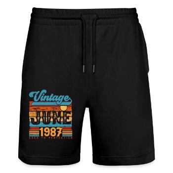 Juni 1987, Vintage-Jubiläumsgeschenk Juni 1987. - Stanley/Stella Unisex Bio Joggingshorts Trainer  - Schwarz - Vorne - Nik (191cm) & Marisol (170cm)