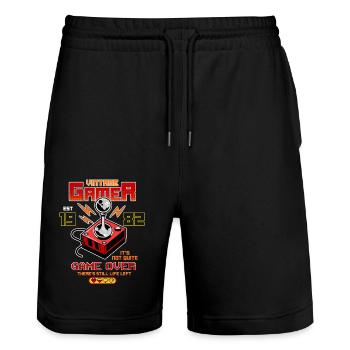 Vintage Gamer seit 1982 Lustige Geburtstagsspiele - Stanley/Stella Unisex Bio Joggingshorts Trainer  - Schwarz - Vorne - Nik (191cm) & Marisol (170cm)