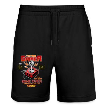 Vintage Gamer seit 1979 Lustige Geburtstagsspiele - Stanley/Stella Unisex Bio Joggingshorts Trainer  - Schwarz - Vorne - Nik (191cm) & Marisol (170cm)