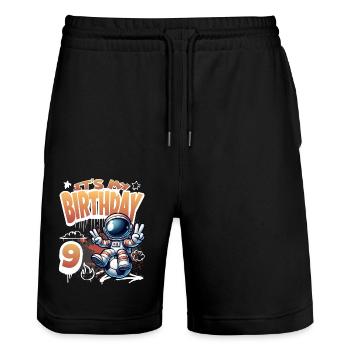 Football Astronaut 9th Birthday - Stanley/Stella Trainer Unisex Organic Jogging Shorts - black - Front - Nik (191cm) & Marisol (170cm)