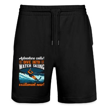 Das Abenteuer ruft! Tauchen Sie ein in die Aufregung des Wasserskifahrens - Stanley/Stella Unisex Bio Joggingshorts Trainer  - Schwarz - Vorne - Nik (191cm) & Marisol (170cm)
