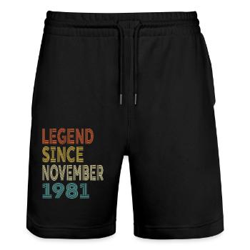 Vintage Legend Depuis novembre 1981, 43ème anniversaire - Short de jogging bio TRAINER Stanley/Stella unisexe - noir - Devant - Nik (191cm) & Marisol (170cm)