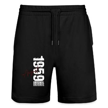 66th Birthday Legend August Born in 1959 - Stanley/Stella Trainer Unisex Organic Jogging Shorts - black - Front - Nik (191cm) & Marisol (170cm)