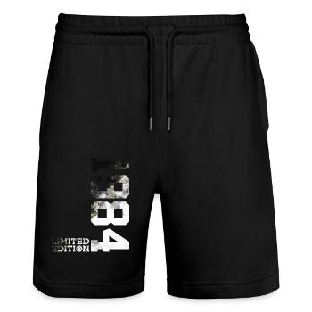 42ND BIRTHDAY LIMITED EDITION 1984 - Stanley/Stella Trainer Unisex Organic Jogging Shorts - black - Front - Nik (191cm) & Marisol (170cm)