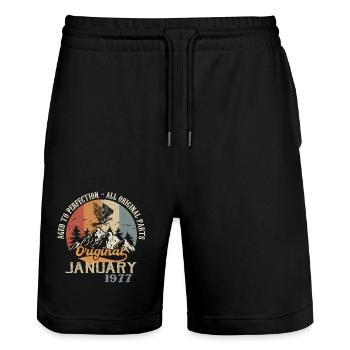 47 Jahre Großartigkeit seit Januar 1977 - Stanley/Stella Unisex Bio Joggingshorts Trainer  - Schwarz - Vorne - Nik (191cm) & Marisol (170cm)
