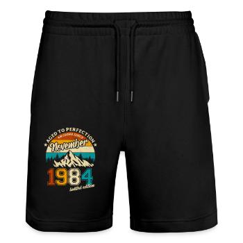 Limited Edition November 1984 Geburtstag Geschenk - Stanley/Stella Unisex Bio Joggingshorts Trainer  - Schwarz - Vorne - Nik (191cm) & Marisol (170cm)