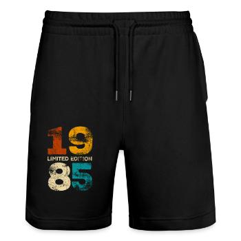 Vintage 1985 Edition Limitée - Cadeau d’anniversaire - Short de jogging bio TRAINER Stanley/Stella unisexe - noir - Devant - Nik (191cm) & Marisol (170cm)