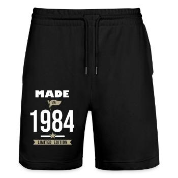 MADE IN 1984 Born in 1984 Anniversary - Stanley/Stella Trainer Unisex Organic Jogging Shorts - black - Front - Nik (191cm) & Marisol (170cm)