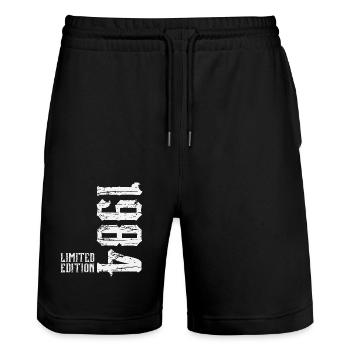 1984 Jahrgang geboren Geburtstag Geschenk - Stanley/Stella Unisex Bio Joggingshorts Trainer  - Schwarz - Vorne - Nik (191cm) & Marisol (170cm)