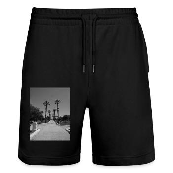 Sicilian beach road with palm trees - Stanley/Stella Trainer Unisex Organic Jogging Shorts - black - Front - Nik (191cm) & Marisol (170cm)