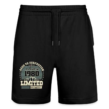 Édition limitée 1980 - Short de jogging bio TRAINER Stanley/Stella unisexe - noir - Devant - Nik (191cm) & Marisol (170cm)