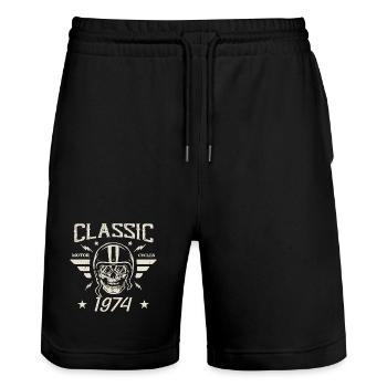 Klassisches Vintage-Geburtstagsgeschenk aus dem Jahr 1974 - Stanley/Stella Unisex Bio Joggingshorts Trainer  - Schwarz - Vorne - Nik (191cm) & Marisol (170cm)