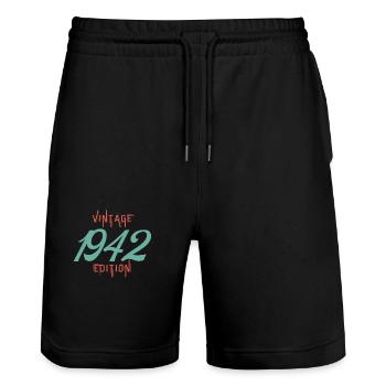 Jahrgang 1942 Ausgabe - Stanley/Stella Unisex Bio Joggingshorts Trainer  - Schwarz - Vorne - Nik (191cm) & Marisol (170cm)