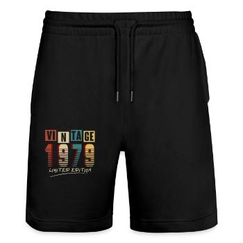 Jahrgang 1979: Limitierte Auflage - 46. Jubiläum. - Stanley/Stella Unisex Bio Joggingshorts Trainer  - Schwarz - Vorne - Nik (191cm) & Marisol (170cm)