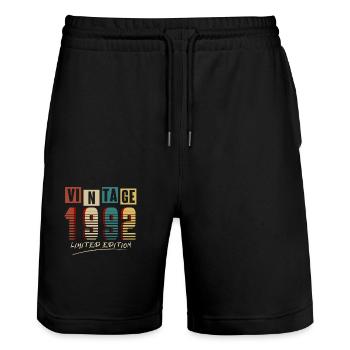 Jahrgang 1992: Limitierte Auflage - 33. Jubiläum. - Stanley/Stella Unisex Bio Joggingshorts Trainer  - Schwarz - Vorne - Nik (191cm) & Marisol (170cm)