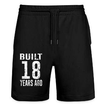 18th Birthday Gift Saying - Stanley/Stella Trainer Unisex Organic Jogging Shorts - black - Front - Nik (191cm) & Marisol (170cm)