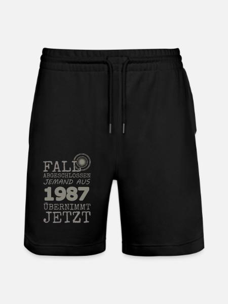 1987 1987 - Stanley/Stella Trainer Unisex Organic Jogging Shorts - black