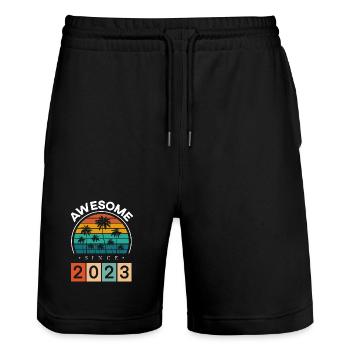 2023 Born Birthday Year of birth vintage - Stanley/Stella Trainer Unisex Organic Jogging Shorts - black - Front - Nik (191cm) & Marisol (170cm)